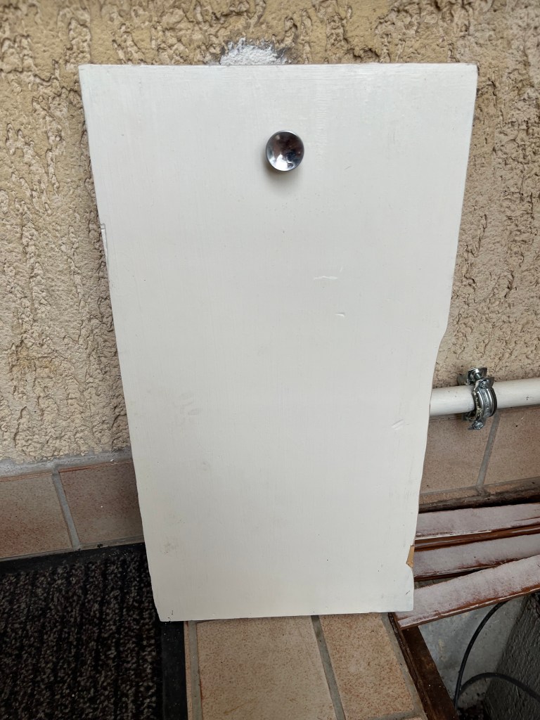 pose d'une porte de trappe